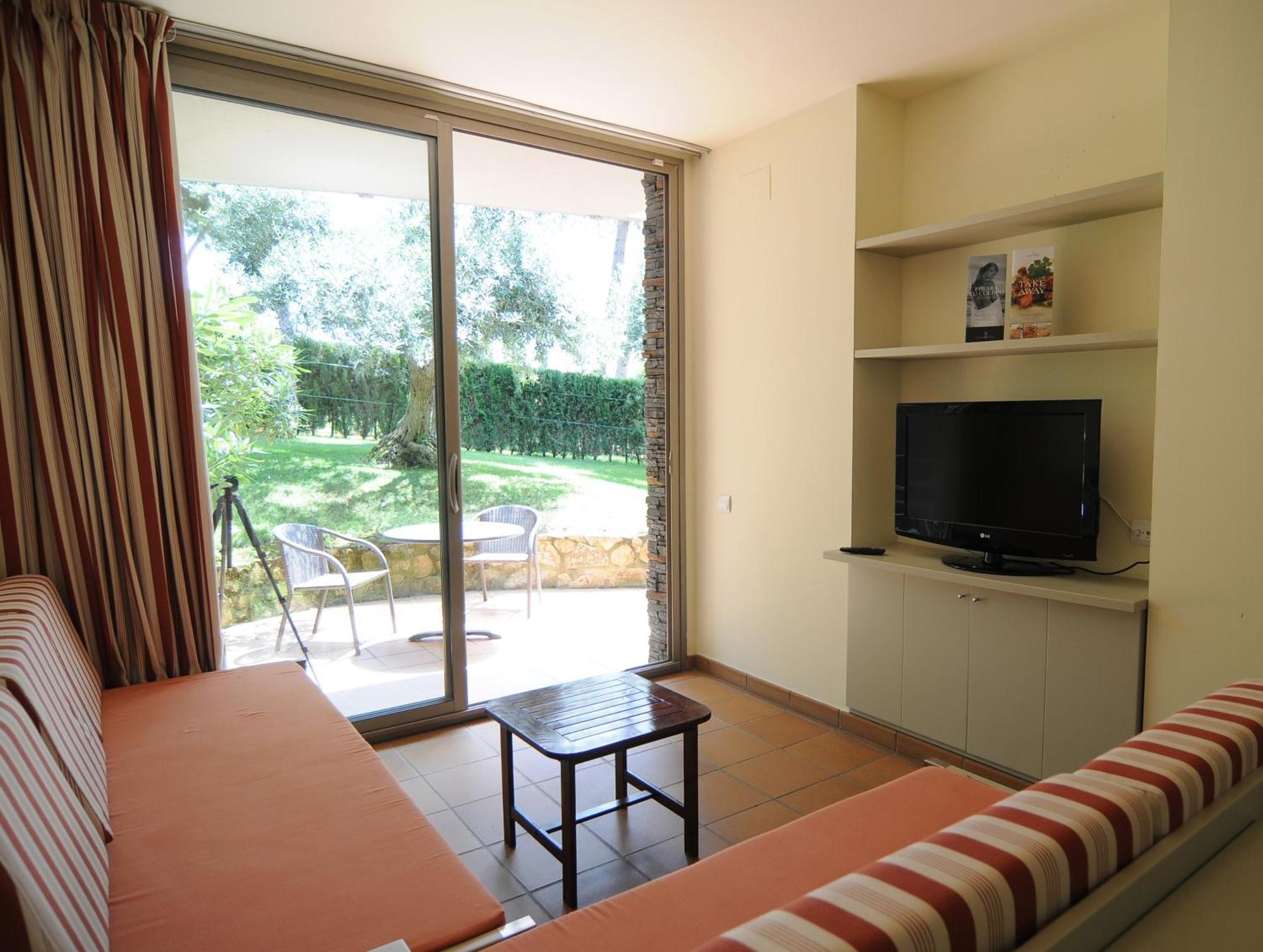 Aparthotel Ciutat De Palol Platja d'Aro Quarto foto